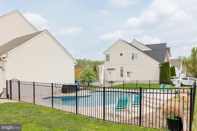view of swimming pool featuring fence and a fenced in pool