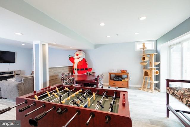 playroom with recessed lighting and wood finished floors