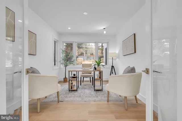 office with recessed lighting, baseboards, and wood finished floors