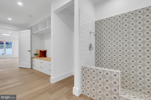 mudroom featuring light wood-style floors and recessed lighting