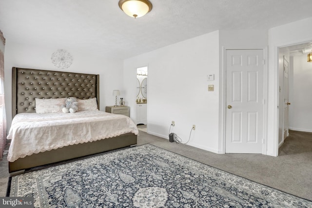 carpeted bedroom with baseboards