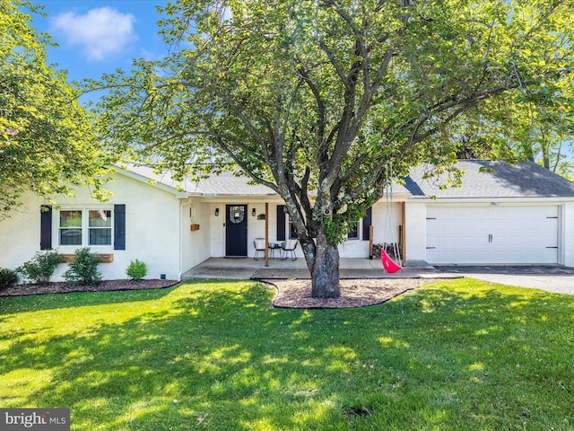 ranch-style home with an attached garage, aphalt driveway, stucco siding, a porch, and a front yard