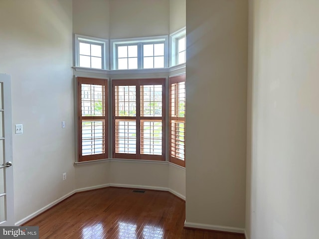 2435 Mill Race Rd, Frederick, MD 21701 - spare room with baseboards, visible vents, and wood finished floors