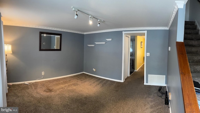 spare room featuring stairs, carpet, crown molding, and baseboards
