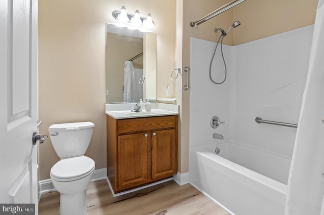 1818 Selvin Dr Unit 204, Bel Air, MD 21015 - full bath with wood finished floors, vanity, shower / bath combo with shower curtain, toilet, and baseboards