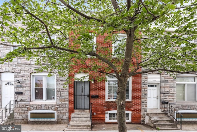 3429 E Lombard St, Baltimore, MD 21224 - view of front of house with stone siding and entry steps