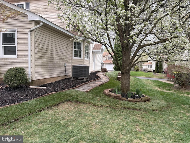 view of yard featuring central AC