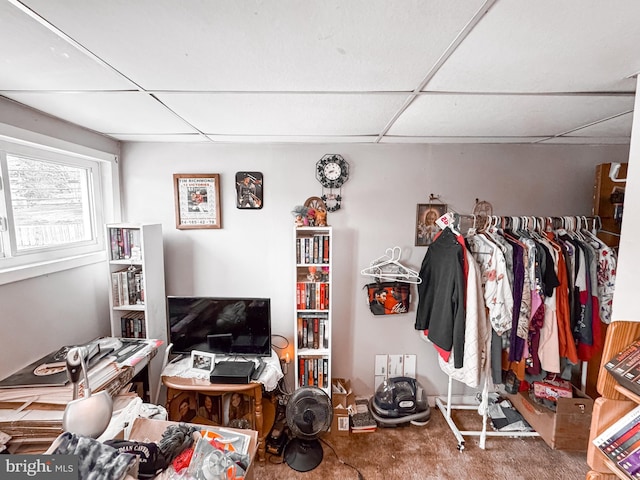miscellaneous room with a paneled ceiling