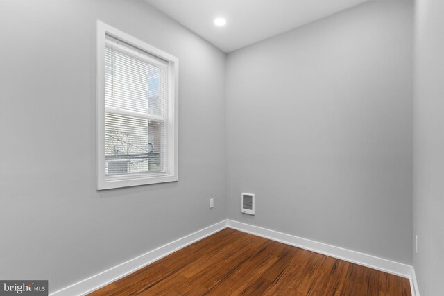 5210 Arch St, Philadelphia, PA 19139 - empty room featuring baseboards, recessed lighting, and dark wood-style flooring