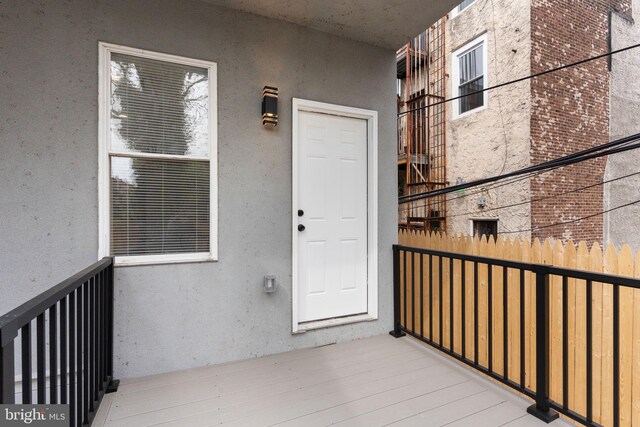 5210 Arch St, Philadelphia, PA 19139 - view of exterior entry featuring stucco siding and brick siding