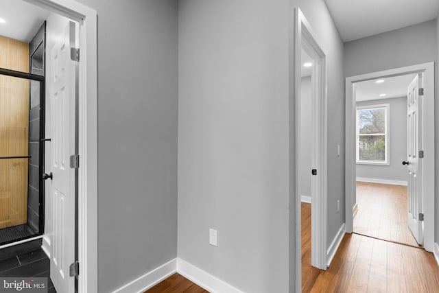 5210 Arch St, Philadelphia, PA 19139 - corridor with recessed lighting, wood finished floors, and baseboards