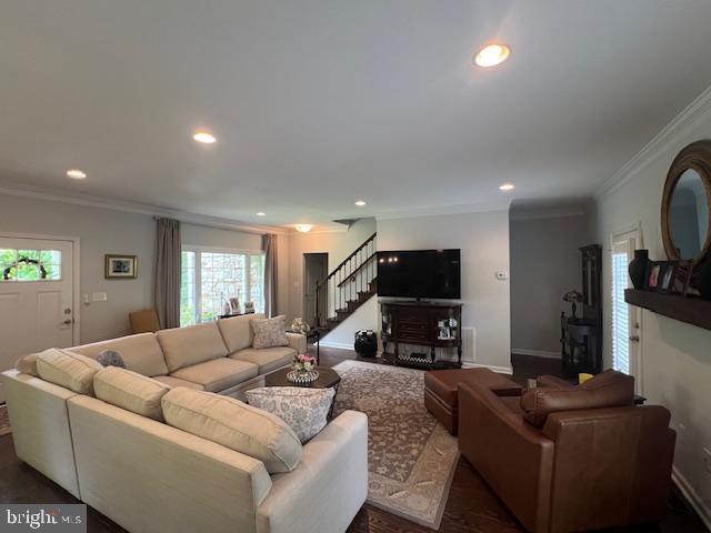 living area with stairway, crown molding, recessed lighting, baseboards, and dark wood-type flooring