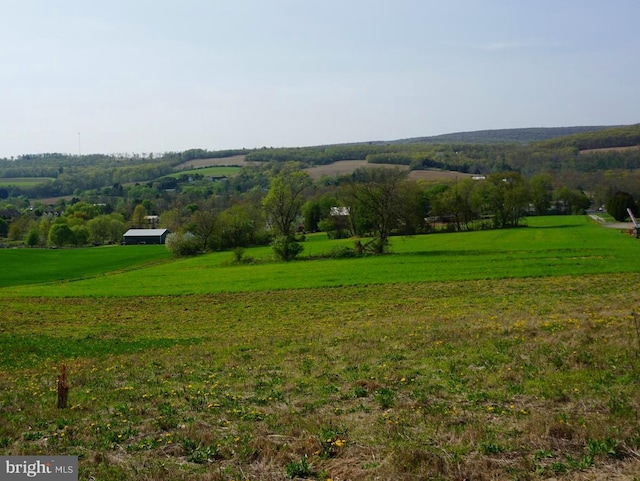 exterior space featuring a rural view