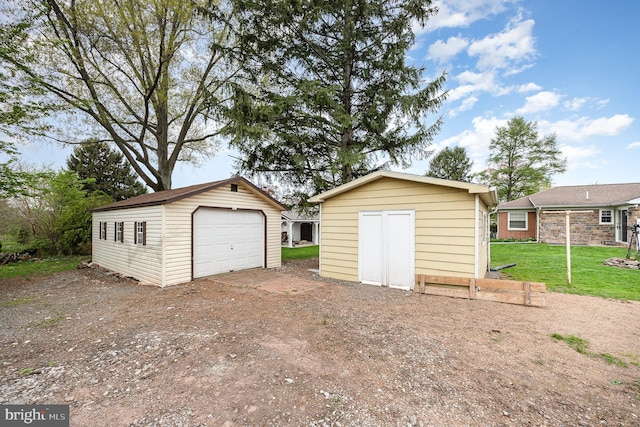 detached garage with driveway