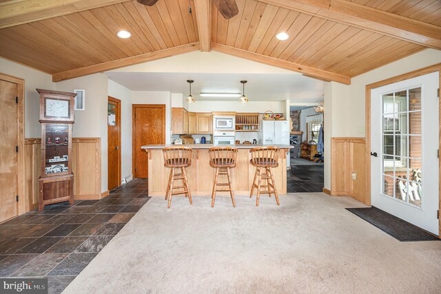 kitchen featuring wood ceiling, white appliances, recessed lighting, and wainscoting