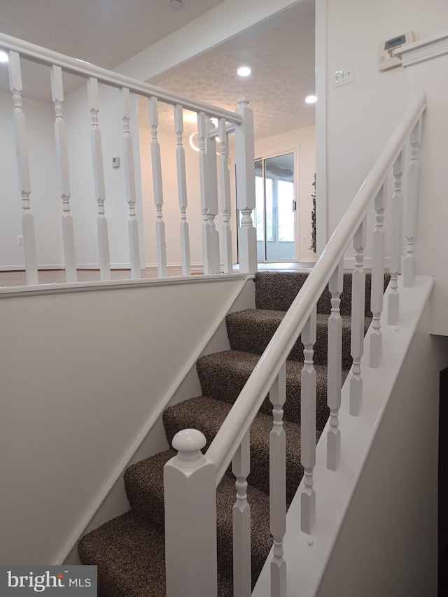 stairs with recessed lighting