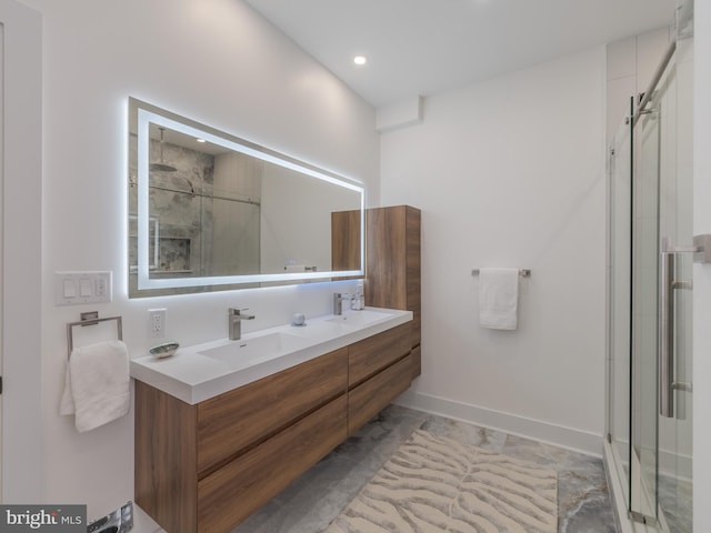 2024 N Palethorp St, Philadelphia, PA 19122 - bathroom featuring a shower stall, double vanity, recessed lighting, and baseboards