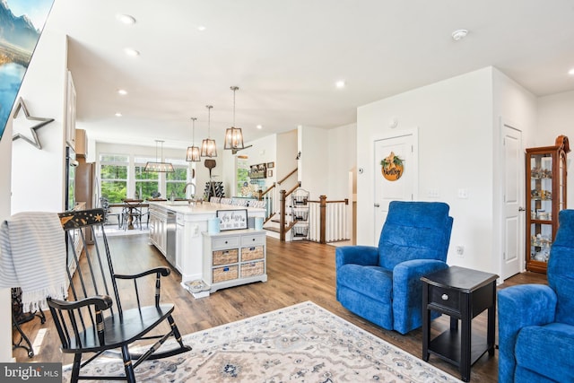 1579 Meadowlark Glen Rd, Dumfries, VA 22026 - living area with recessed lighting, wood finished floors, and stairway
