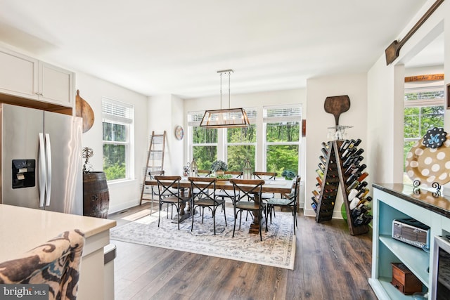 1579 Meadowlark Glen Rd, Dumfries, VA 22026 - dining space featuring baseboards and dark wood finished floors