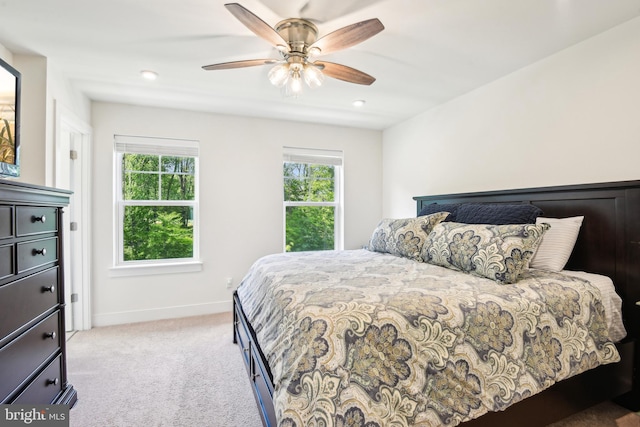 1579 Meadowlark Glen Rd, Dumfries, VA 22026 - bedroom featuring baseboards, multiple windows, a ceiling fan, and light colored carpet