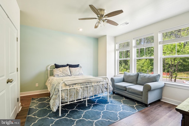 1579 Meadowlark Glen Rd, Dumfries, VA 22026 - bedroom featuring baseboards, visible vents, multiple windows, and wood finished floors