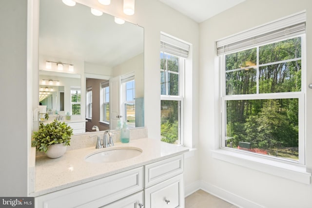 1579 Meadowlark Glen Rd, Dumfries, VA 22026 - bathroom featuring vanity, baseboards, and tile patterned floors