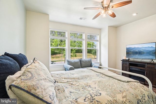 1579 Meadowlark Glen Rd, Dumfries, VA 22026 - bedroom with visible vents, baseboards, ceiling fan, and multiple windows