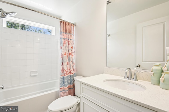 1579 Meadowlark Glen Rd, Dumfries, VA 22026 - full bathroom with shower / bath combo with shower curtain, visible vents, toilet, and vanity
