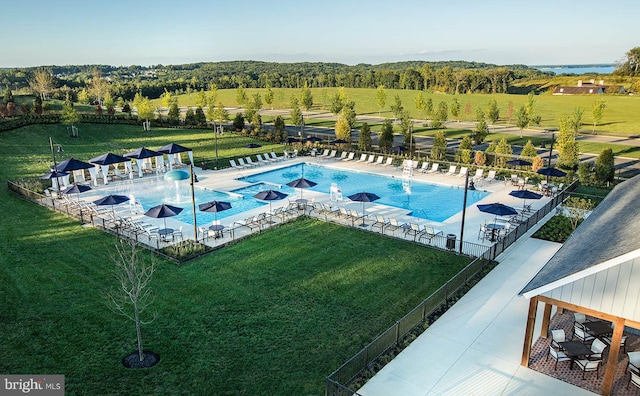 1579 Meadowlark Glen Rd, Dumfries, VA 22026 - community pool with a lawn, a patio, and fence