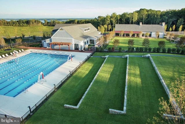 1579 Meadowlark Glen Rd, Dumfries, VA 22026 - community pool with a lawn, fence, and a pergola