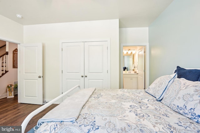 1579 Meadowlark Glen Rd, Dumfries, VA 22026 - bedroom featuring baseboards, a closet, and dark wood-type flooring