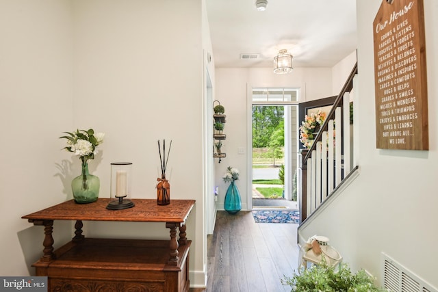 1579 Meadowlark Glen Rd, Dumfries, VA 22026 - entryway featuring stairway, baseboards, wood finished floors, and visible vents