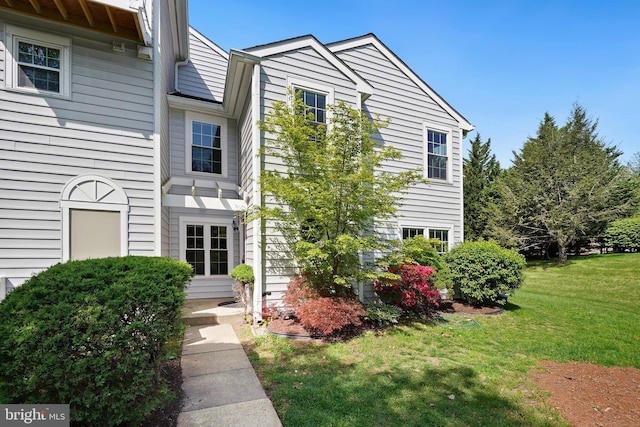 24 Amarillo Ct Unit 125, Germantown, MD 20874 - view of front facade featuring a front lawn