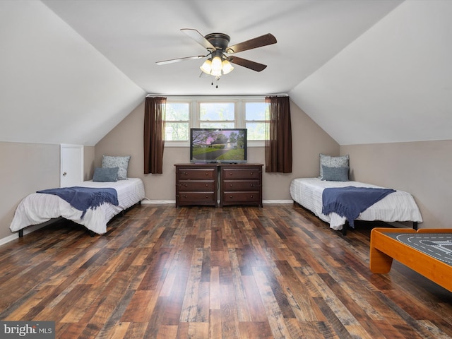 bedroom with wood-type flooring, ceiling fan, and vaulted ceiling