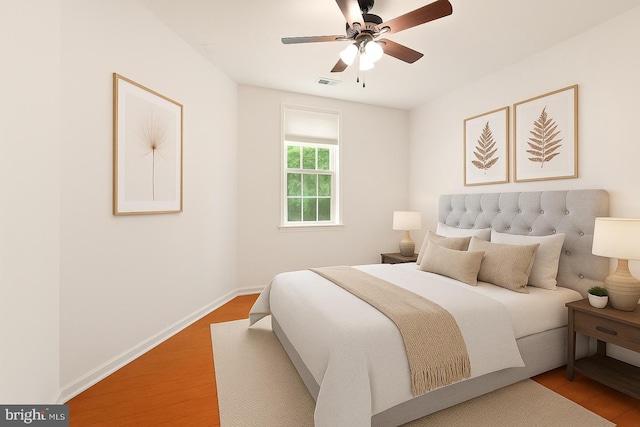 400 Cameron Station Blvd Unit 105, Alexandria, VA 22304 - bedroom featuring light wood finished floors, baseboards, and a ceiling fan