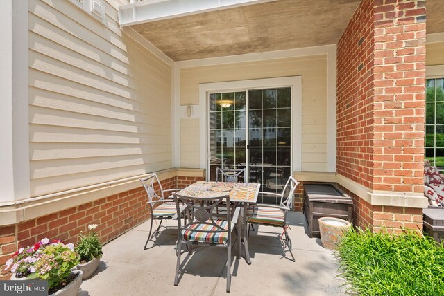 400 Cameron Station Blvd Unit 105, Alexandria, VA 22304 - view of patio / terrace featuring outdoor dining area