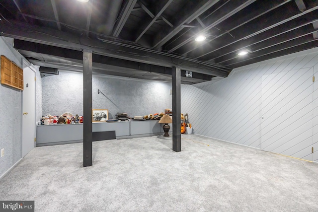 finished below grade area with carpet flooring