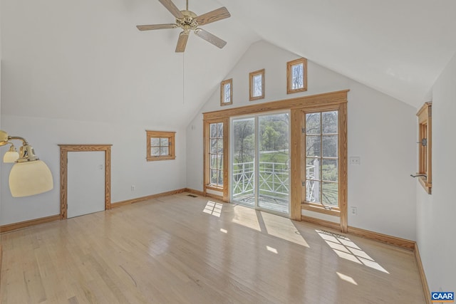 bonus room with wood finished floors, baseboards, ceiling fan, and high vaulted ceiling