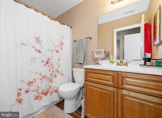 11 Gooseneck Ln, Smyrna, DE 19977 - full bath featuring toilet, vanity, wood finished floors, and curtained shower