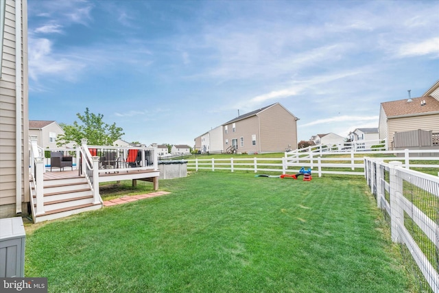 11 Gooseneck Ln, Smyrna, DE 19977 - view of yard featuring a wooden deck and a residential view