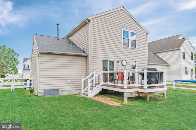 11 Gooseneck Ln, Smyrna, DE 19977 - rear view of property with a wooden deck and roof with shingles