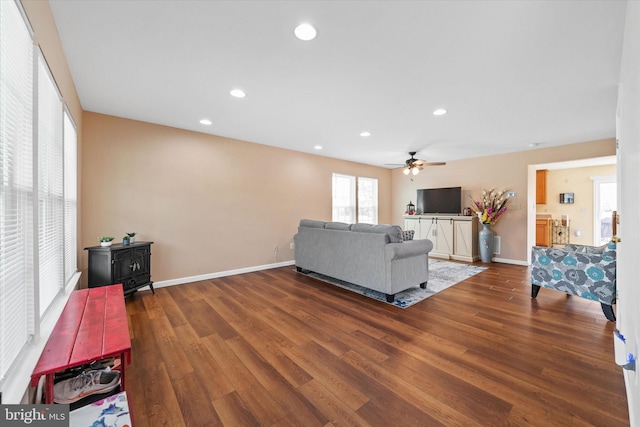 11 Gooseneck Ln, Smyrna, DE 19977 - living room featuring wood finished floors, a wood stove, a ceiling fan, recessed lighting, and baseboards