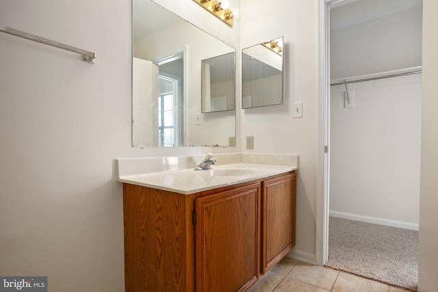 bathroom with vanity and tile patterned flooring