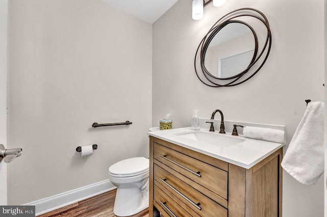 20 Wolfpack Rd, Hamilton, NJ 08619 - bathroom with vanity, baseboards, wood finished floors, and toilet