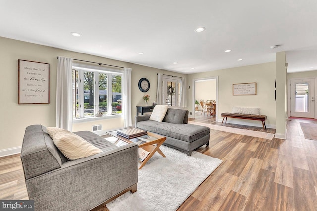 20 Wolfpack Rd, Hamilton, NJ 08619 - living room with recessed lighting, baseboards, wood finished floors, and a wealth of natural light