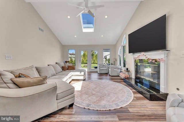 20 Wolfpack Rd, Hamilton, NJ 08619 - living area featuring ceiling fan, visible vents, a skylight, wood finished floors, and high vaulted ceiling