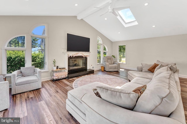 20 Wolfpack Rd, Hamilton, NJ 08619 - living room with a skylight, plenty of natural light, beamed ceiling, and a ceiling fan