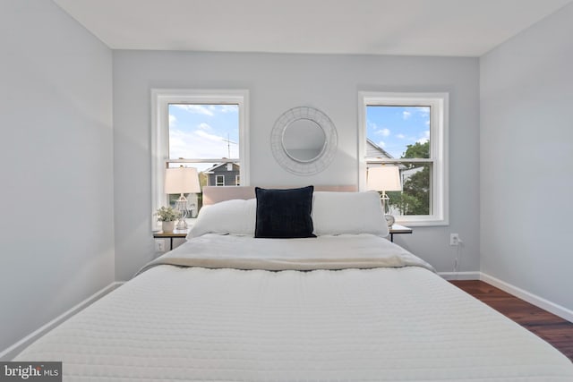 538 Pontiac, Baltimore, MD 21225 - bedroom with dark wood-style flooring and baseboards