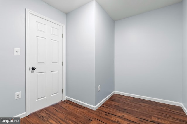 538 Pontiac, Baltimore, MD 21225 - empty room with dark wood-style flooring and baseboards