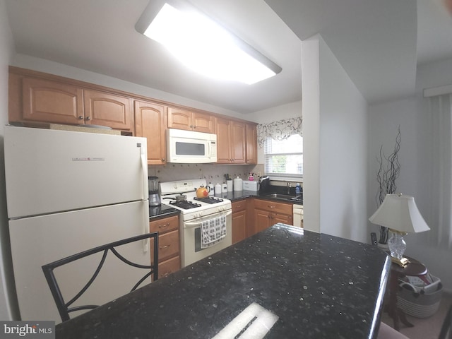 1512 Marcy Pl Unit B, Philadelphia, PA 19115 - kitchen with white appliances and dark stone countertops